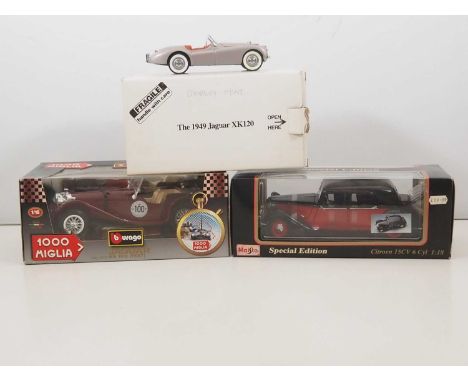 A pair of 1:18 scale diecast cars by BBURAGO and MAISTO together with a 1:24 scale DANBURY MINT Jaguar XK120 - VG/E in G/VG b