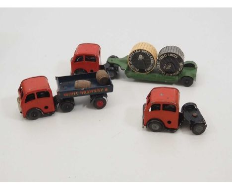 A pair of vintage TRIANG MINIC clockwork articulated lorries, comprising a Brewery example and Low Loader with cable drum loa