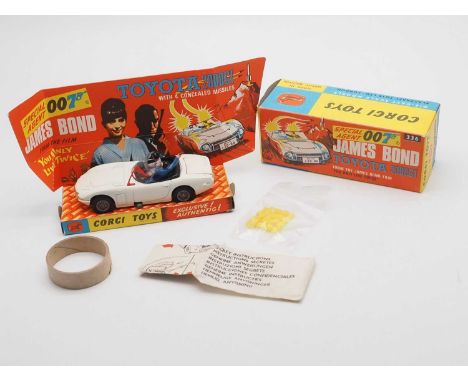 A CORGI 336 diecast James Bond Toyota 2000GT from the film 'You Only Live Twice', complete with instructions, 8 x missiles (4