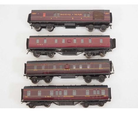 A group of vintage O gauge EXLEY mainline coaches to include a travelling Post Office and a kitchen car all in LMS livery - G