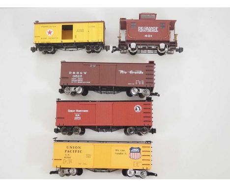 A group of G scale American Outline box cars and a caboose by BACHMANN all with upgraded running gear - VG (unboxed) (5)