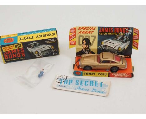 A CORGI 261 diecast James Bond's Aston Martin DB5 in original box with original pictorial display stand, spare bandit and ins