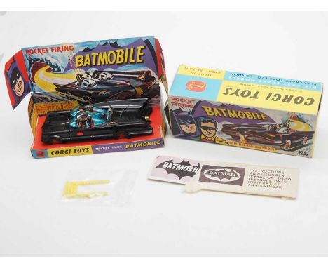 A CORGI 267 diecast Batmobile in original box, complete with instruction sheet, supplementary instruction sheet, instructions