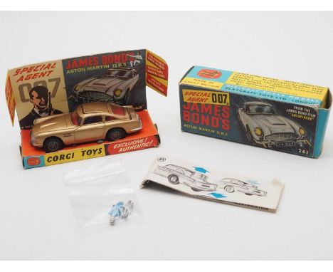 A CORGI 261 diecast James Bond's Aston Martin DB5 in original box with original pictorial display stand, spare bandit and ins