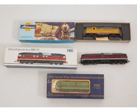 A pair of PIKO HO gauge diesel locomotives in East German and Polish liveries together with an ATHEARN American Outline Union