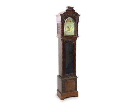 A late Victorian mahogany chiming longcase clock,with gilt brass fretwork and scroll engraved dial, painted moonphase and sil