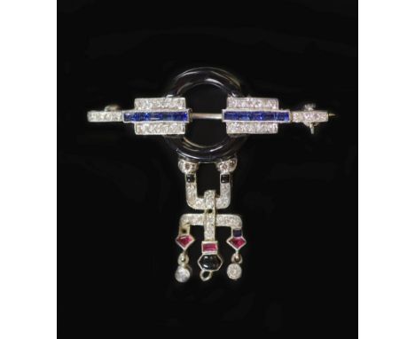 An Art Deco white gold, black enamel, ruby, sapphire and diamond set drop brooch,35mm, gross weight 7.8 grams.