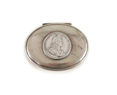 A George I silver oval snuff box,with hinged cover, the lid inset with medal commemorating the coronation of George I, unmark