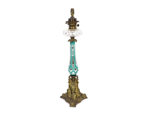 A rare ormolu mounted overlaid ‘mercury’ glass table lamp, the glass possibly by James Powell &amp; Sons, mid 19th century,on