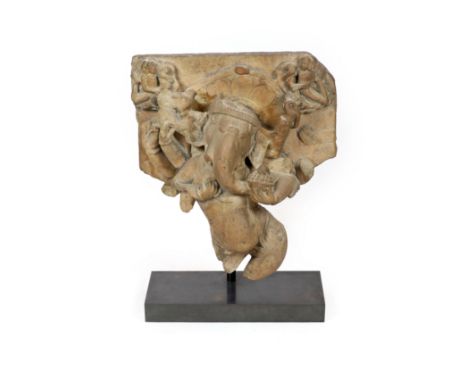 An Indian sandstone Ganesha stele fragment, Rajasthan 11th/12th century,the multi-armed elephant-headed god dancing with his 