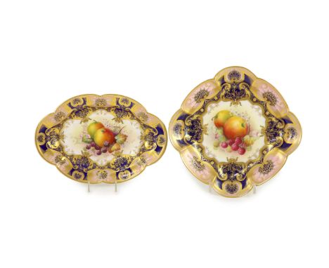 Two Royal Worcester fruit painted dessert dishes, signed E. Phillips, c.1918,each within gilt-decorated cobalt blue and pink 