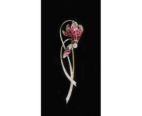 A mid 20th century, gold and platinum graduated ruby and diamond set foliate brooch, in gilt tooled fitted leather case,72mm,