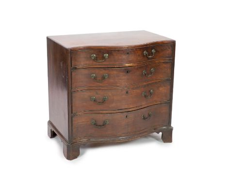 A George III mahogany caddy top serpentine chest,fitted four graduated long drawers flanked by stop fluted angles, on bracket