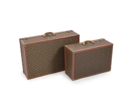 Two graduated Louis Vuitton Alzer suitcase trunks,both interiors labelled LOUIS VUITTON, AVE MARCEAU 78 PARIS, NICE 2 AVE GUS