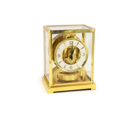 A Jaeger le Coultre gilt metal Atmos clock,with Arabic / baton numeral dial, movement number 450671,width 18cm depth 13.5cm h