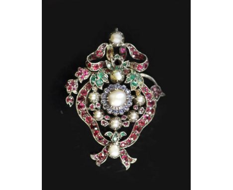 A 19th century Austro Hungarian silver and gold, ruby, sapphire, emerald and split pearl gem set pendant broochof oval form w