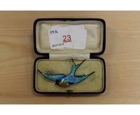Silver and enamel swift brooch