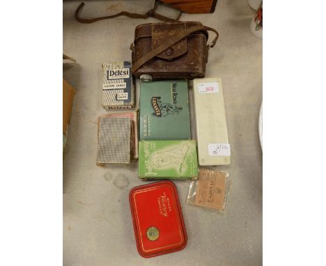 Various playing cards, dominoes, camera, etc.