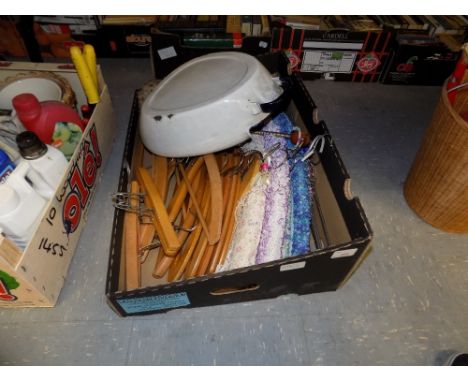 Box of wooden coat hangers and shoe stretchers