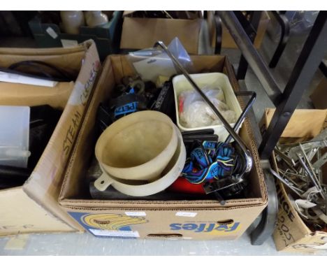 Box of various tools, car jacks, etc.