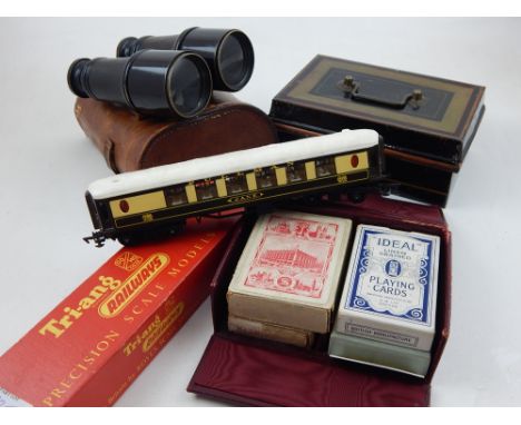 A pair of late Victorian Gregory & Co. field glasses, tan leather cased, together with vintage playing cards and sundries