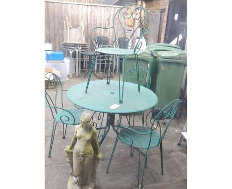 A vintage green painted metal patio table and four chairs together with a reconstituted stone three graces bird bath and a ga