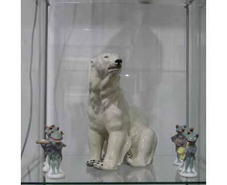 A Wagner and Apel continental porcelain Polar Bear, with factory stamp to base, 23cm tall, together with a continental porcel