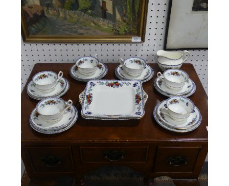 A Samuel Radford 'Locarno' pattern part Tea Set, decorated in fruits with gilding, to include six Teacups and Saucers, six Pl