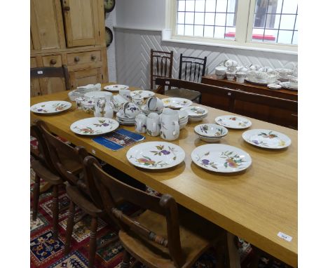 A Royal Worcester 'Evesham' pattern part Dinner Service, to include Dinner Plates, Dessert Plates, Side Plates, four Tea Cups