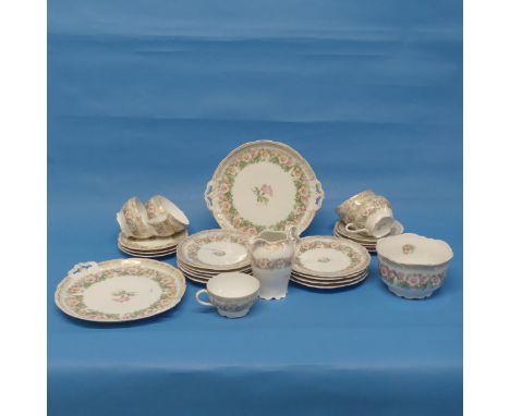 A Bavarian porcelain Iris pattern part Tea Service, to include seven Tea Cups, seven Saucers, eight Plates and two Cake Plate