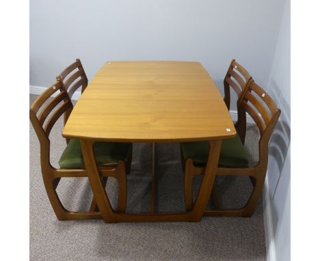 A Retro teak extending Dining Table, of rounded rectangular shape with butterfly style extra leaf, 134cm long x 78cm wide x 7