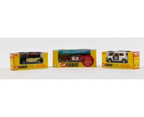 3 Corgi Toys. A Ferrari 206 DINO Sport (344) in red with white doors, RN30, red spot Whizzwheels example. Plus a Mini-Cooper 
