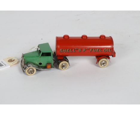 Tri-ang Minic pre-war articulated B.P. &amp; SHELL Fuel Oil Tanker. 31M. Green cab with plated mudguards, Petrol Can to passe
