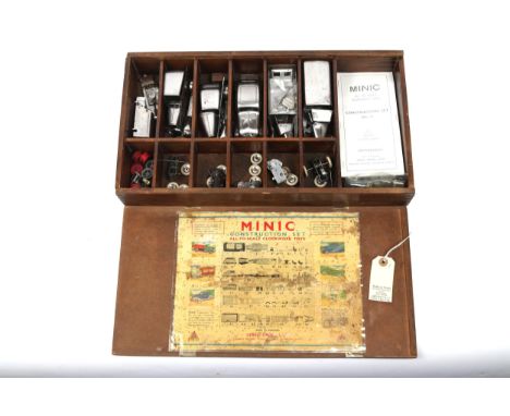 A very scarce Tri-ang Minic Construction set No.1, containing parts to construct and paint 6 vehicles. Set includes bare meta