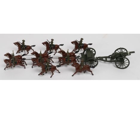 Britains WW1 British infantry in Khaki uniform. 4 separate mounted on horseback with articulated right arm, together with Art