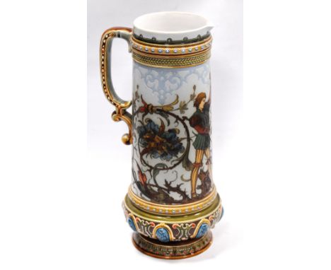 German Mettlach stoneware jug decorated with Renaissance figures, signed G. Warth, 31.5cm high.