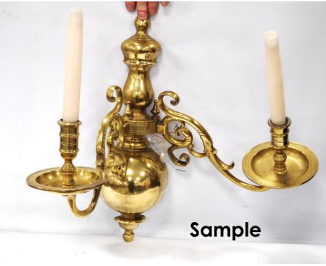 Set of three Dutch-style brass twin-branch wall lights with globe finials, 41cm x 49cm.