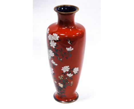 Japanese cloisonne enamel high-shouldered vase decorated with birds and flowers on a red ground, unmarked, 24cm high. Conditi