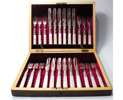 Set of twelve Victorian close plated fish knives and twelve forks with pearl handles, cased.