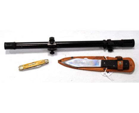 Winchester rifle scope, black, 37cm long; a throwing knife 'Truflite', and a horn pen knife.  (3)