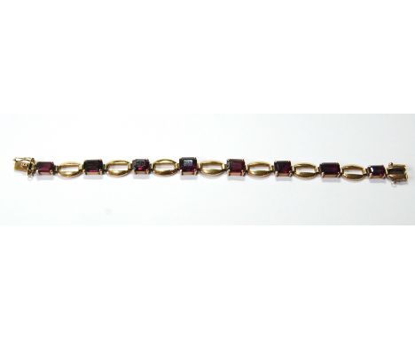 9ct gold amethyst line bracelet with rectangular-cut stones and pierced oval links, marked '9ct', 18cm long.