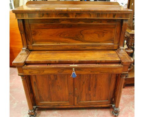 George IV rosewood secretaire, the superstructure above a mechanical writing slope and two cupboards, 124cm high and 110cm wi