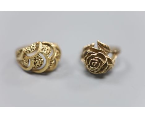 A 9ct plain and textured gold modernist design ring and a 9ct gold rose design ring, gross 11.3g