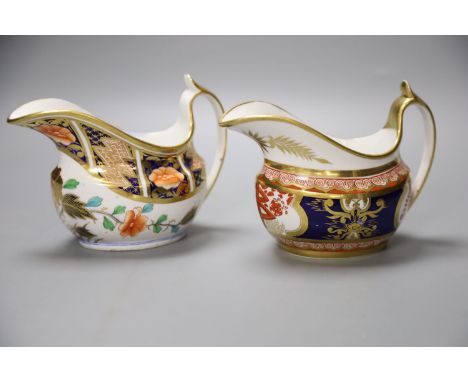 A Spode cream jug painted in imari style with the dollar pattern 715 and another Spode cream jug painted in imari styleCONDIT