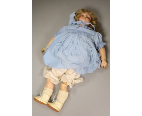 A Kammer and Reinhardt sleeping eyes bisque head doll