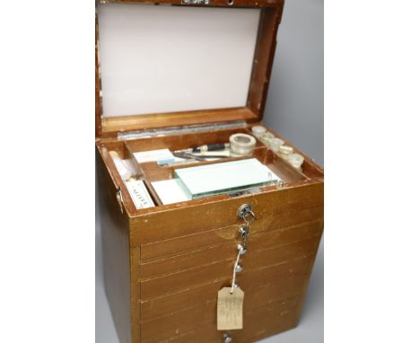 An early 20th century dentistry cabinet and tools