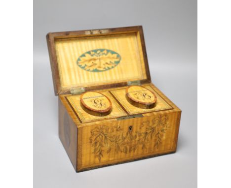 A George III harewood and marquetry tea caddy, c.1810, the fitted canisters labelled 'G' and 'B' for green and black tea, wid