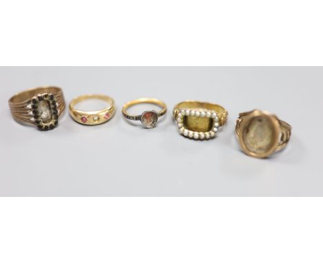 A 15ct and gem set ring 9a.f.) gross 2.3 grams and four other 19th century yellow metal rings(a.f.), including French enamell