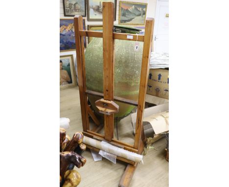 A wooden adjustable artist's studio easel, from the studio of George Bissill (1896-1973), Four Ashes, Ashmansworth, Hampshire