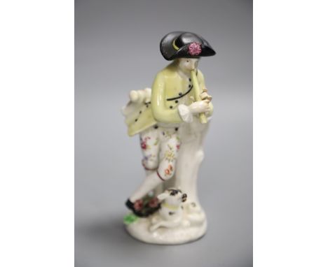 An 18th century Bow figure of a piper with dog after a Meissen model by J.J. Kaendler, height 15cmCONDITION: Hands and his pi